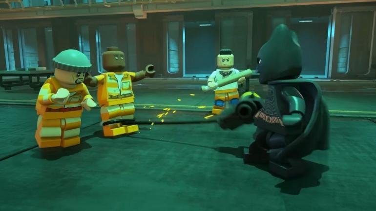 Una scena di combattimento di LEGO Batman L'Eredità del Cavaliere Oscuro, che mostra un'azione fluida e dinamica, con un'ispirazione visiva dalla serie Arkham.