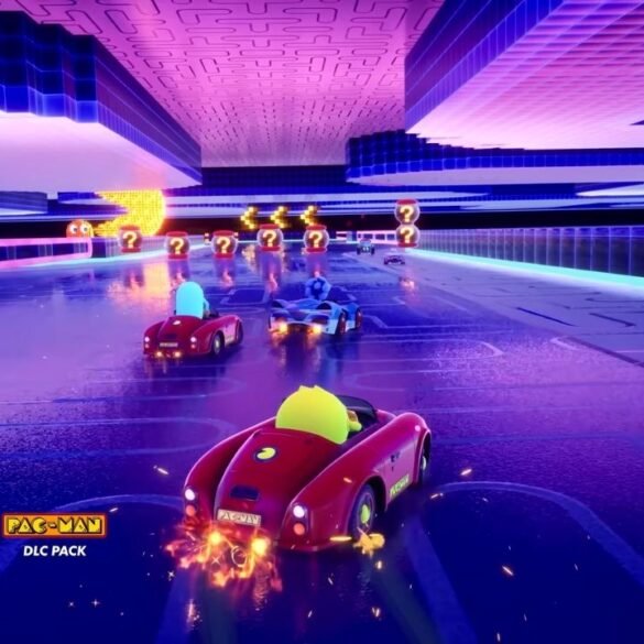 Un'immagine che mostra PAC-MAN in un kart su una pista ispirata ai suoi giochi, in competizione con Sonic e gli altri personaggi.