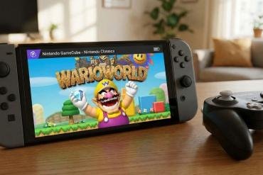 Wario ride mentre stringe un diamante, con lo sfondo del logo Nintendo GameCube Classics in esecuzione su Nintendo Switch 2.