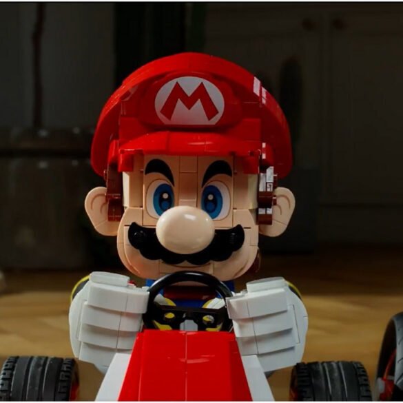 Un dettaglio del teaser di Nintendo che mostra la parte anteriore verde del kart di Luigi accanto al modello LEGO di Mario.