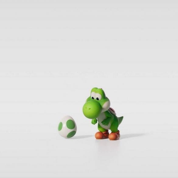 Primo piano di Yoshi dal nuovo trailer di The Super Mario Galaxy Movie, con un'espressione sorpresa e divertente.