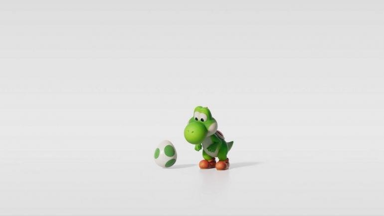 Primo piano di Yoshi dal nuovo trailer di The Super Mario Galaxy Movie, con un'espressione sorpresa e divertente.