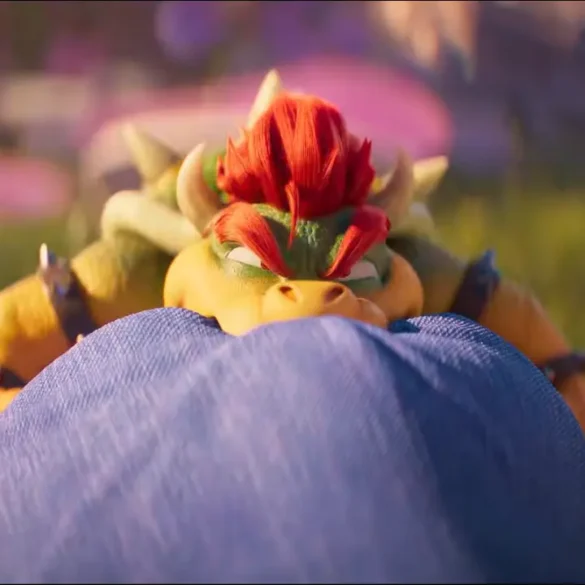 Mini Bowser arrabbiato mentre morde Mario nel trailer di The Super Mario Galaxy Movie.