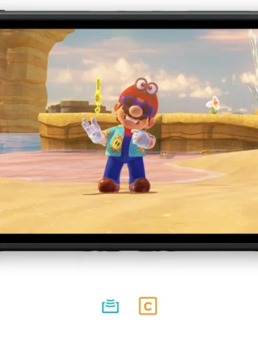 Schermata di gioco di Super Mario Odyssey su console Nintendo Switch 2 che mostra Mario nel Regno del Mare, con icone GameShare e pulsante C evidenziati per la modalità cooperativa.