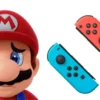 Joy-Con Nintendo Switch con sovrimpresso il simbolo dell'euro, riferimento alla multa da 35 milioni della DGCCRF
